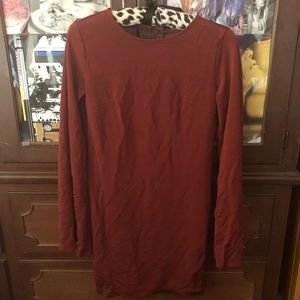 Burnt orange bell sleeve mini dress with open back